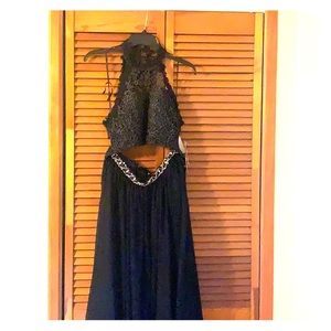 Two-piece navy blue jeweled prom dress.